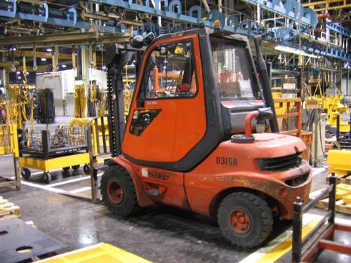 351G02033630; 6,000 lb. Diesel, 2-Stage Mast, 48" Forks, 130" Max Lift Height, Solid Tires, Full Cab