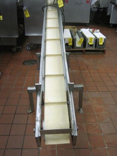 W X 9' L, cleated neoprene belt, 1" Cleats, spaced 12" apart, 44" discharge, 230/440 volt  Click for