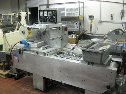 1/2" Between chains, set up w/3 across, 2 deep,  4" W X 5 1/2" L die set, Busch 10032 vacuum pump,
