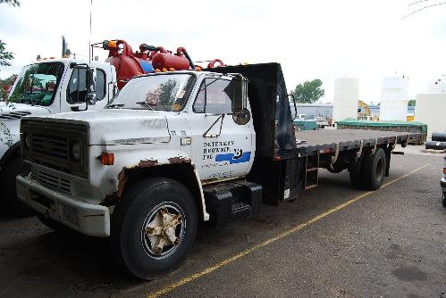3; 24’ Bed, 170,067 Miles, Power Tilting Bed (Current License and DOT) (Fridley) [Location: