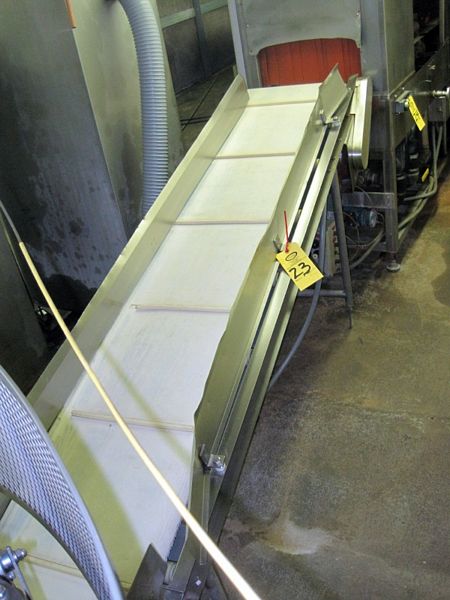 L cleated neoprene belt, 1/2 cleats, 16" apart, from Cryovac packager to shrink tunnel, Rigging