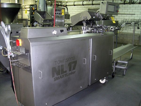230 volt, 3 phase, 60 Hertz, Mitsubishi touch screen controls, w/looper chain conveyor & manual