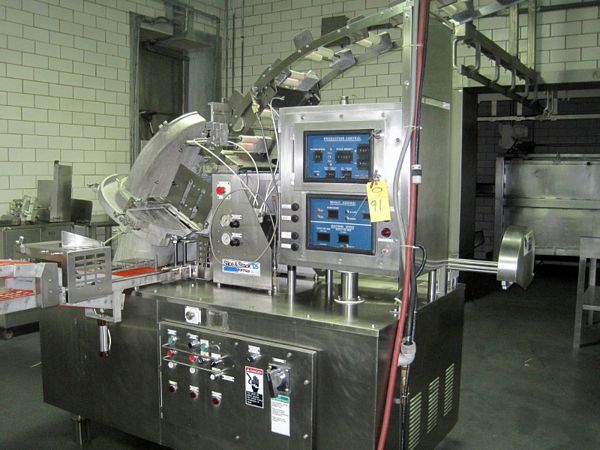 er w/checkweigher system. eagle belting, out feed conveyor, knife heater & knife sharpener, complete