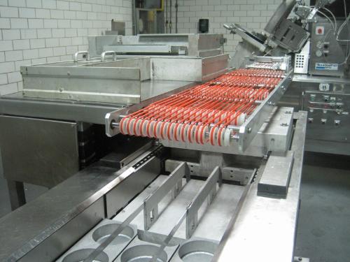 custom made by Multivac to work w/Multivac 530 Vacuum Packager to be more efficient loading
