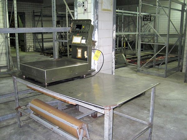 ale, 200 X .1 LB cap., 24" W X 28" L s.s. top, (1) S.S. Table Top w/mild steel legs & 36" roll Kraft