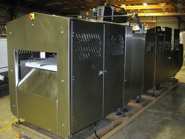up, 3 lane, (Set up for 8" X 10" trays) 
Modified Atmosphere Inpack Tray Sealer with 
OTBX96