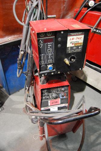 urrent Welding Power Source. S/N. U1951014737; W/ Lincoln LN-742 Wire Feed. Welder is on wheels