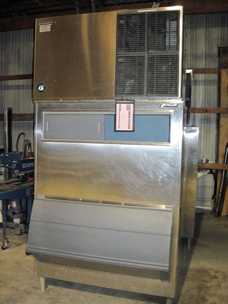 duces up to 1,296 LBS/day, w/Follet holding bin, bin measures 27” W X 46” L X 56” D, 230 volts,