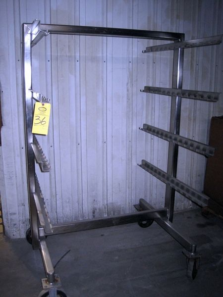 between shelves, fits 42” smoke stick, overall 46 ½” W X 42” L X 72” H, on wheels