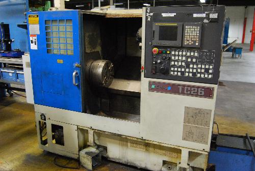 " (4) Jaw Chuck; (12) Position Turret; Chip Conveyor; Fanuc Series 18i-T CNC Control