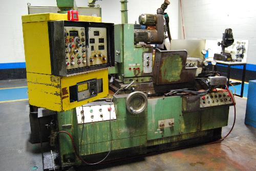 der Model DA. S/N. 35432A376-0002; 10" Swing x 18" Between Centers; 40" Dia. X 4" Width Grinding