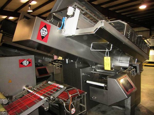 touch screen controls (up to 100 programs), up to 3,200 slices per minute, automatic loading