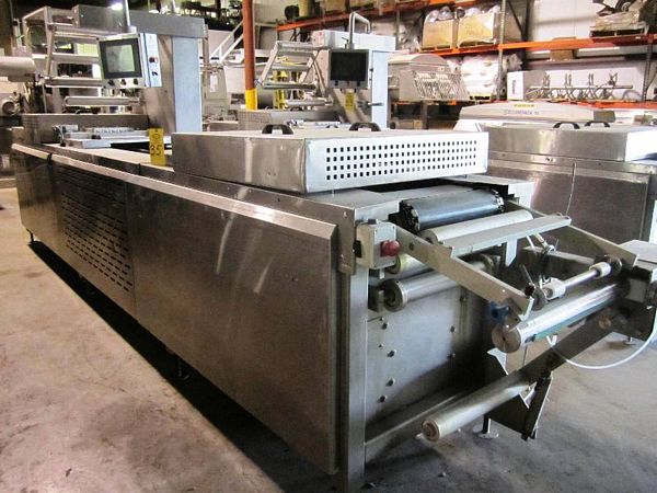 , 2-lane, approx. 400 mm between chains, approx. 400 mm advance, 4 up die, each pocket measures