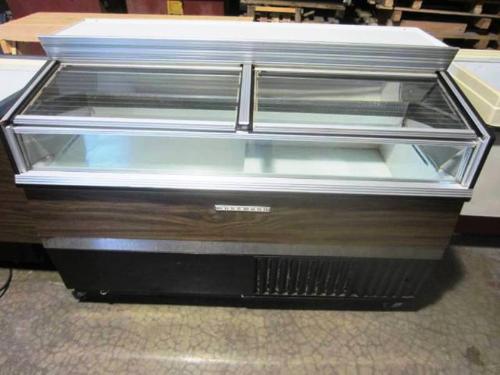 (2) sliding glass top doors, staggered depth 16" & 27" D, 60" Long, plastic rolls ****Located in
