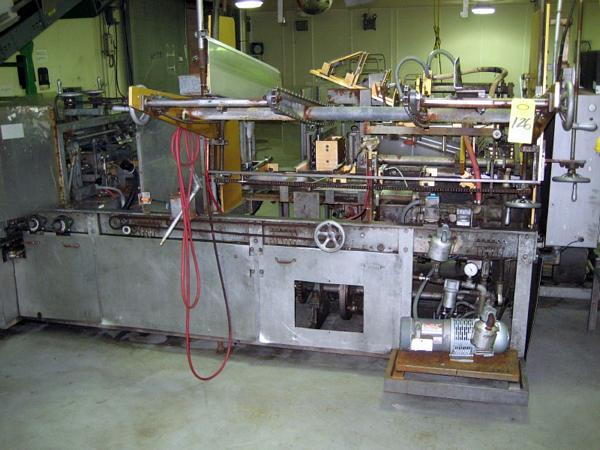 Metra Matic Infeed w/Nordson Mdl. HM, Ser. #AA91L07483