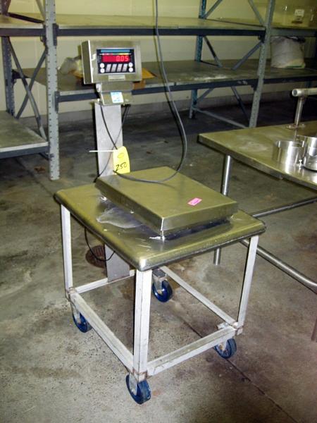 ., 14" X 18" table, s.s. top  on s.s. stand  w/wheels