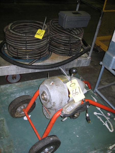 4) spools of sewer rod on cart