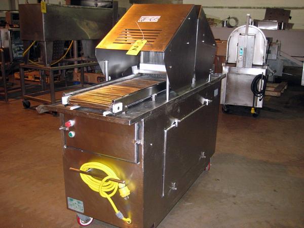 48 blades, 12IN W X 73IN L s.s. chain belt, on wheels, 220/460 volt, 5 h.p., missing main door
