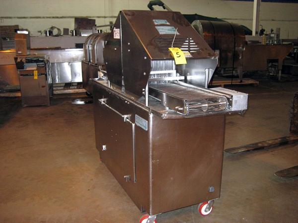 48 blades, 12IN W X 73IN L s.s. chain belt, on wheels, 220/460 volt, 5 h.p., missing some blades,