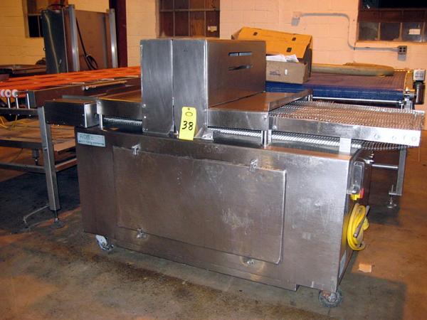 4" W X 6' L, on wheels, no needles, belt damaged, broken fingers