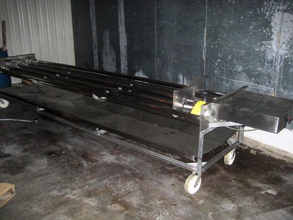 linders on casters, (designed for round or square forms), s.s. tube frames, solid s.s. lower bed,