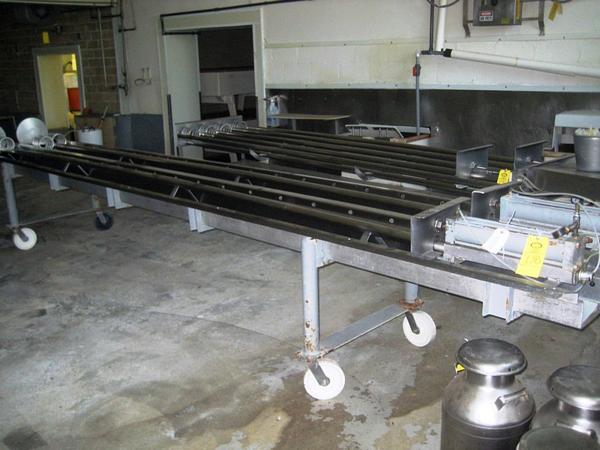 r cylinders on casters, 21' L x 36" W x 34" H, includes s.s. center tube for 4 row pressing for