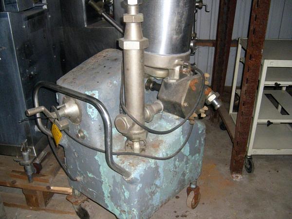 Feeder, Ser. #1832, s.s. hopper is 10" diameter X 16" H, mild steel frame on casters, overall