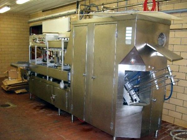 ealer, In-line design forms fills & seals standard cross section paper half gallon cartons, for free