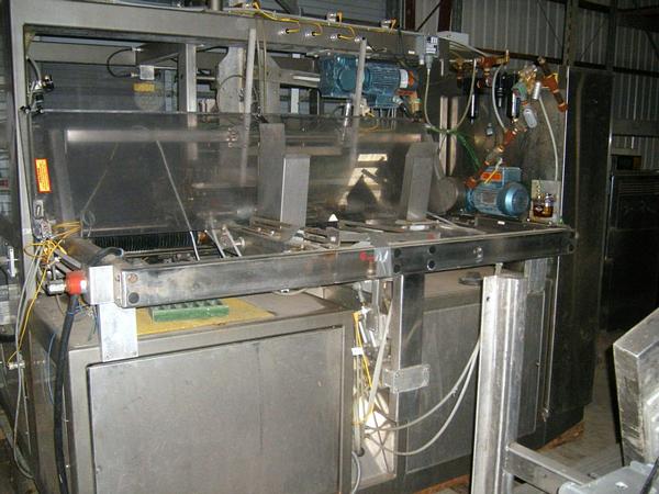 ated Case Packer (Loading, Forming, Sealing) Packs 320 cups per minute in 12 or 24-cup cases,