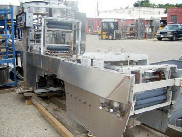 al Rollstock Vacuum Packager, used to form and seal 1 1/2" X 1 1/2" X 1/2" deep portion pack