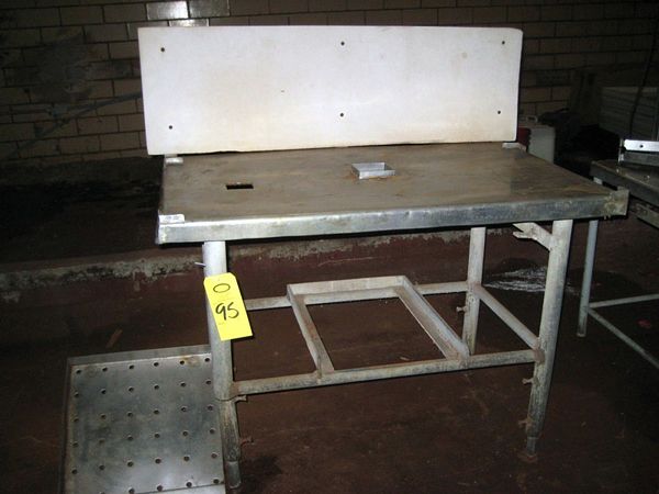 lash, 2 holes cut in top  ; located in Grenada, Mississippi