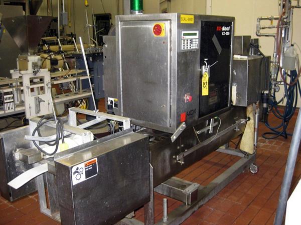 w/twin screw infeed & heat tunnel 29" W X 24" H X 6' L, set up for 6" cup, on s.s. frame