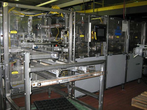 Vertical S.S. Case Packer, Ser. 1934-1101, w/Nordsen 3500V hot melt system & A-B Panelview 1000