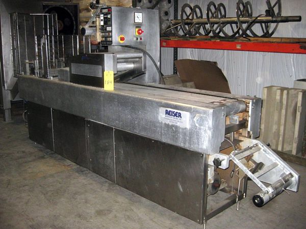 Packager w/Busch Mdl. 100-132 vacuum pump, approx. 300 mm between chains, 220 volt, 3 phase  **
