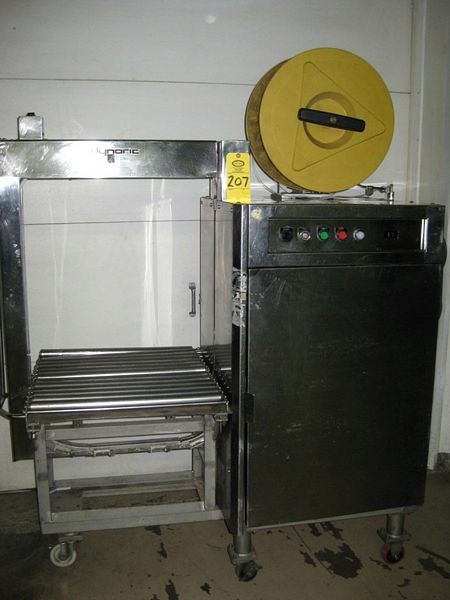 H work area, s.s. frame & rollers, uses 3/8" W plastic strapping  **Located In Yorkville, IL