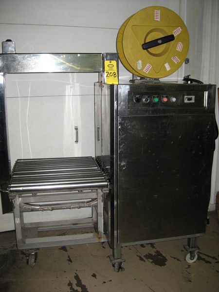 H work area, s.s. frame & rollers, uses 3/8" W plastic strapping  **Located In Yorkville, IL