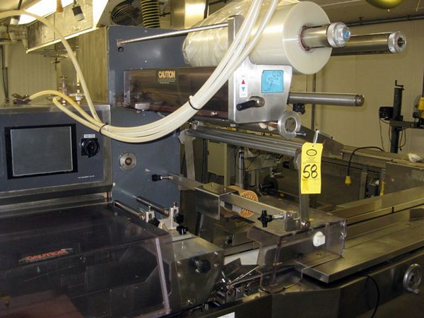 Fill & Seal Machine, 9" W X 15' 7" L belt, touch screen controls, TB Woods E-Trac A/C Converter,
