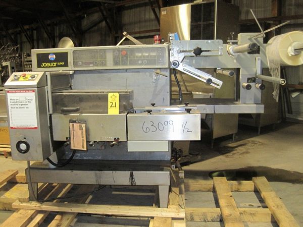 horizontal wrapper, 2-up 7" W vertical sealing jaws, 9 1/2" W X 32" L rubber out feed belt, 26" W
