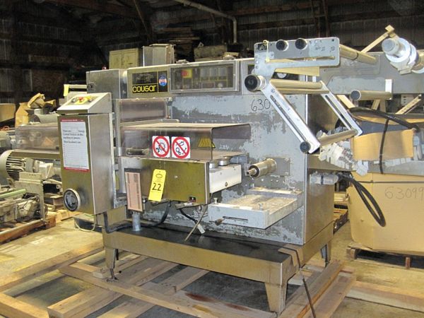 horizontal wrapper, 2-up 8" vertical sealing jaws, 9" W X 32" L rubber out feed conveyor, 28" W
